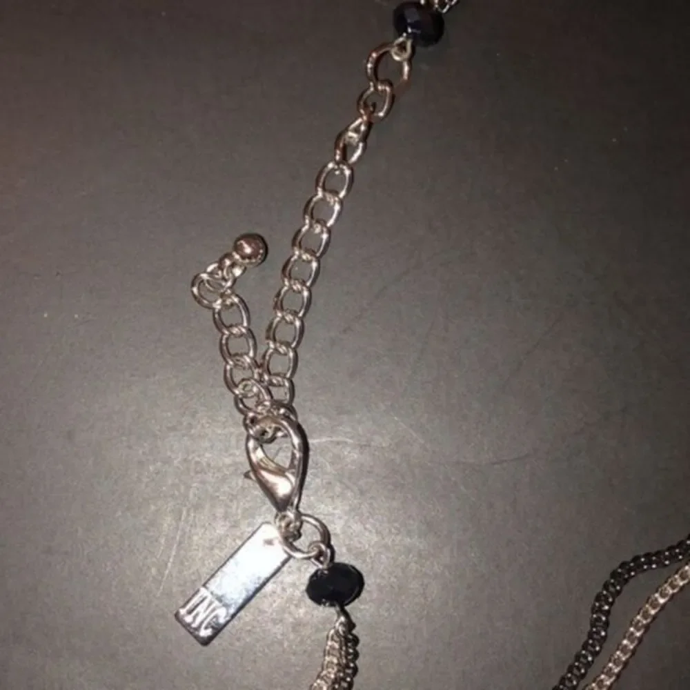 INC long necklace silver tone with glass Brad’s necklace